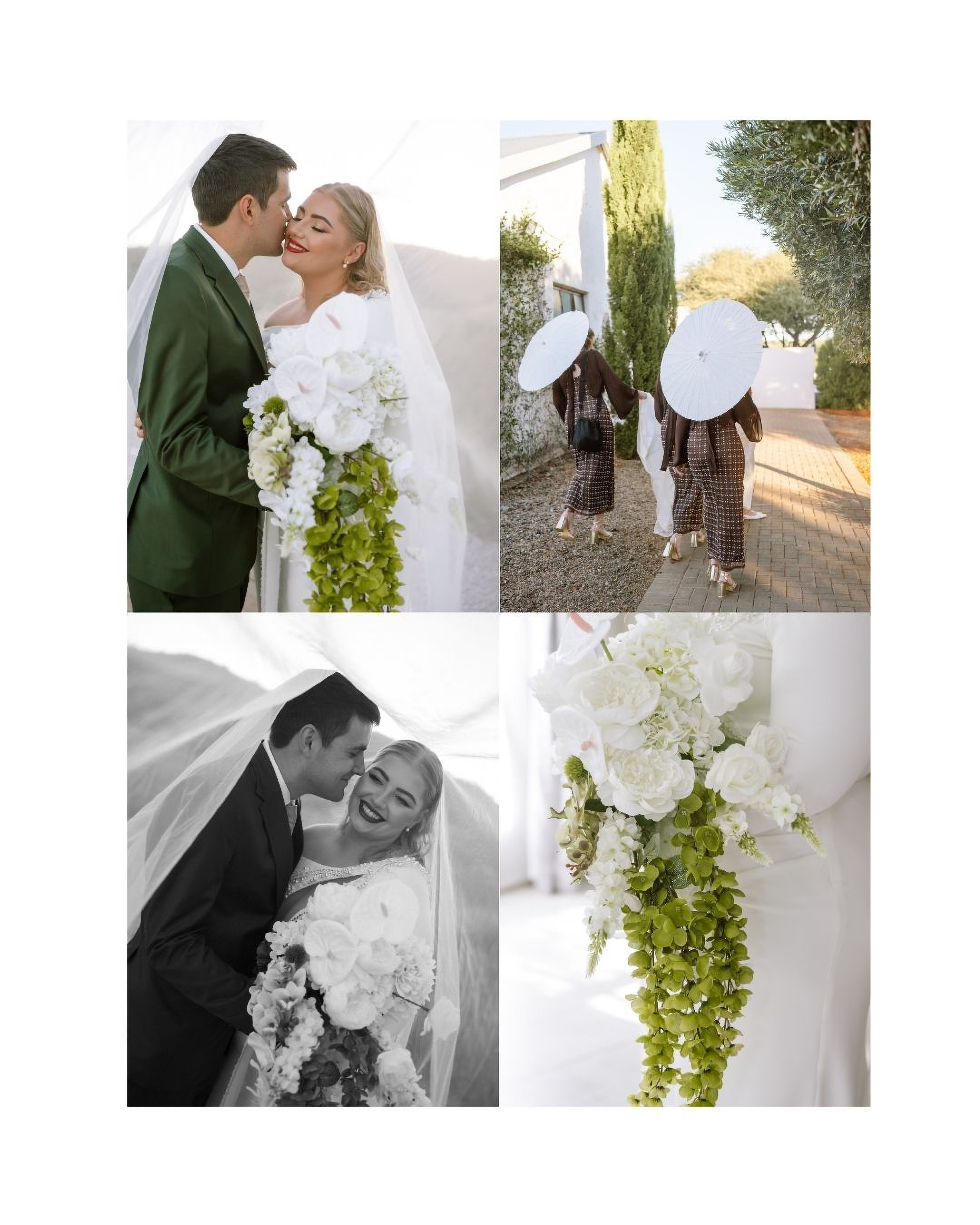 A groom in a green suit kisses his smiling bride holding a dramatic white and green cascading bouquet